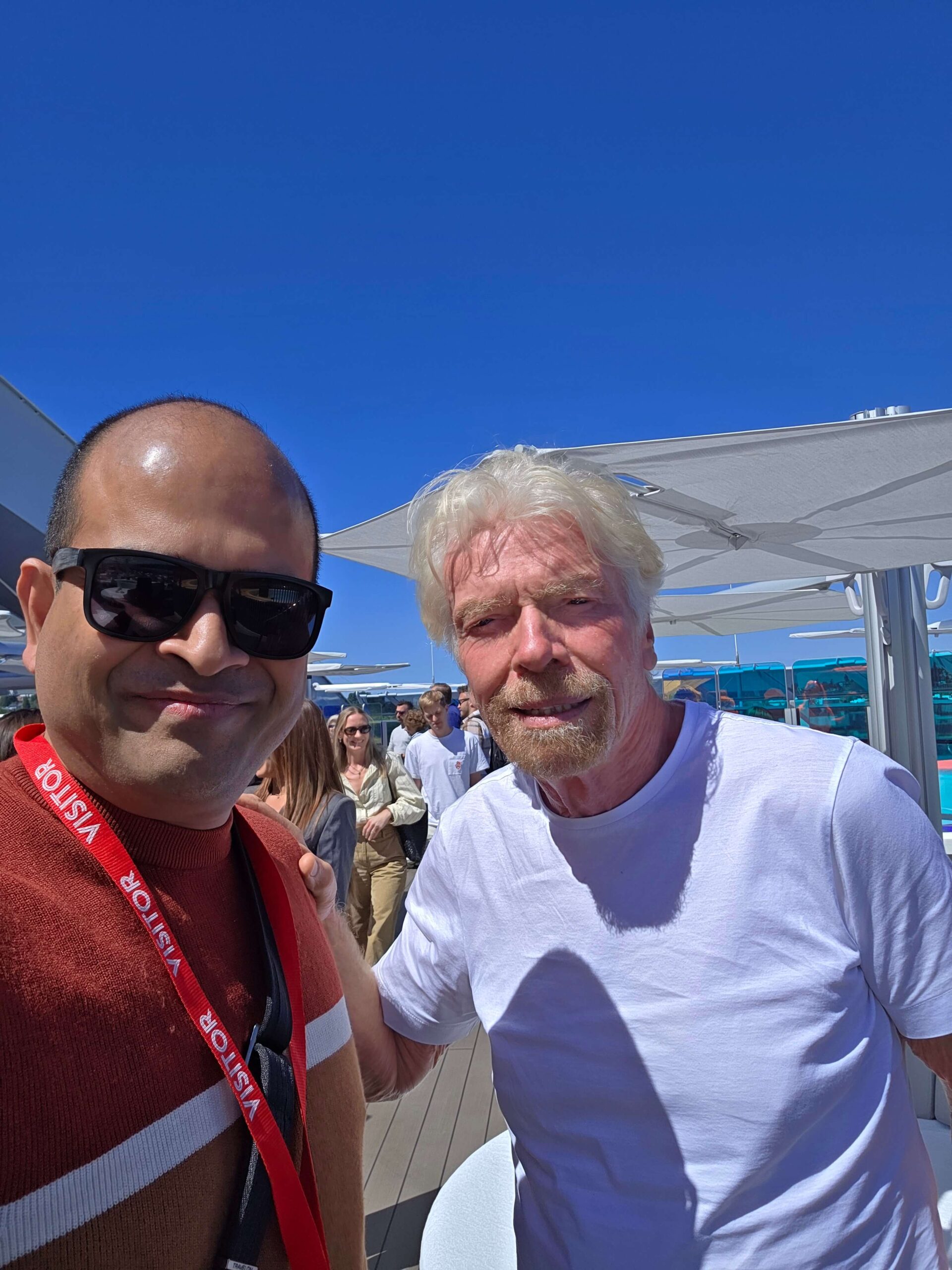 Journeyvibe travel consultancy owner meeting with Sir Richard Branson on a premium cruise ship deck