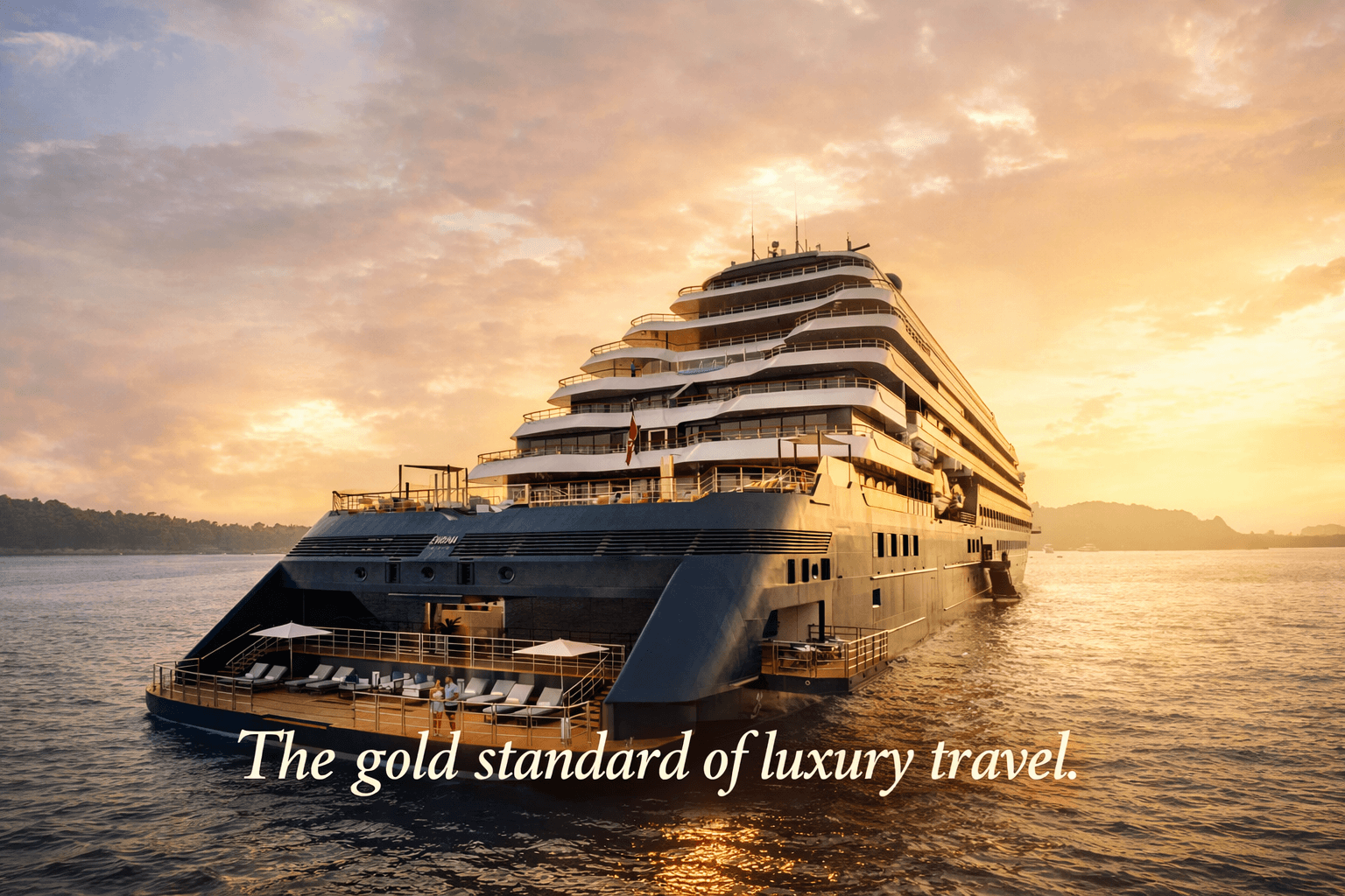 Rear view of the luxury superyacht Evrima by The Ritz-Carlton Yacht Collection at sunset, showing the multi-level decks and outdoor lounge areas.