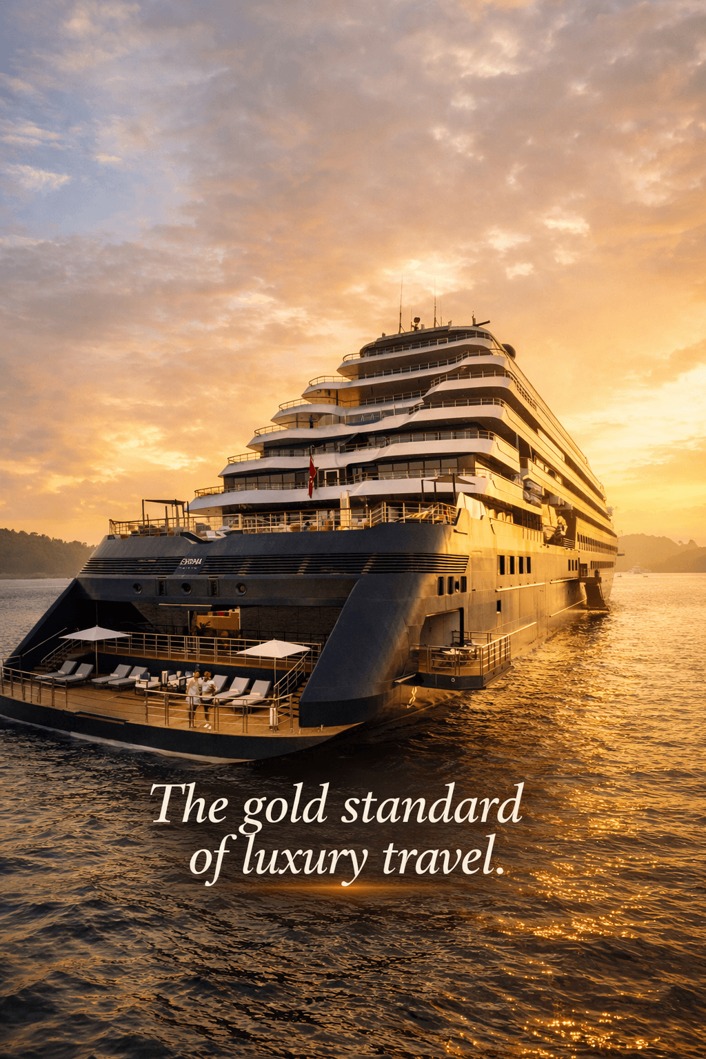 Rear view of the luxury superyacht Evrima by The Ritz-Carlton Yacht Collection at sunset, showing the multi-level decks and outdoor lounge areas.